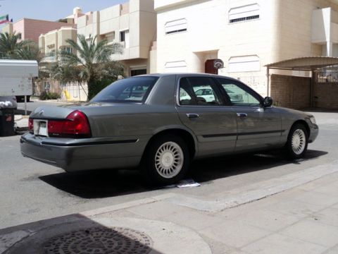 2001 Mercury Grand Marquis - This 2001 Mercury Grand Marquis is seen from the rear three-quarter angle on a sunny day.