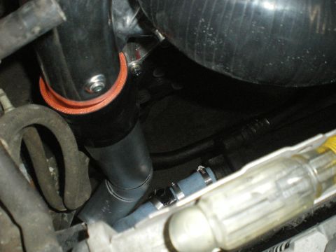 1998 Ford Crown Victoria - Custom intercooler piping is installed in the engine bay, secured with metal hose clamps.