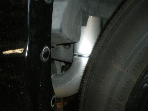 1998 Ford Crown Victoria - Custom intercooler piping is visible near the tire, suggesting aftermarket modifications.