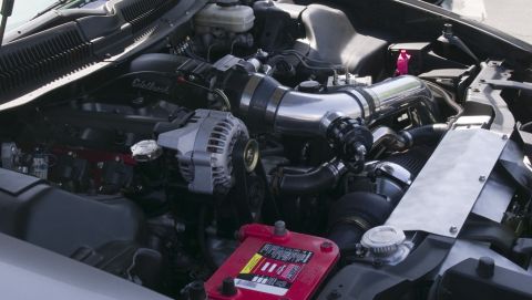 2006 Cadillac STS - Aftermarket modifications are visible in the engine bay, including a new air intake system and intercooler piping.