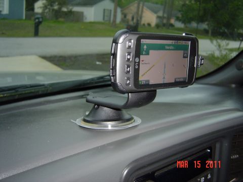 2005 Chevrolet Silverado 1500 - A GPS device is mounted on the dashboard of a vehicle, displaying navigation information and a date stamp from 2011.