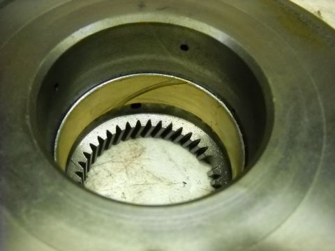 1993 Ford C-150 (Centurion Conversions) - Internal view of a mechanical component, showing a toothed gear within a housing.