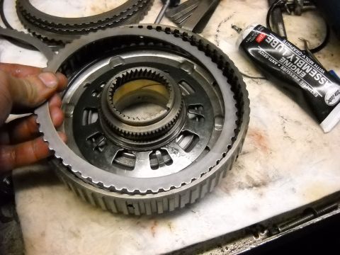 1993 Ford C-150 (Centurion Conversions) - Transmission clutch pack and input shaft components are shown with a tube of assembly lube.