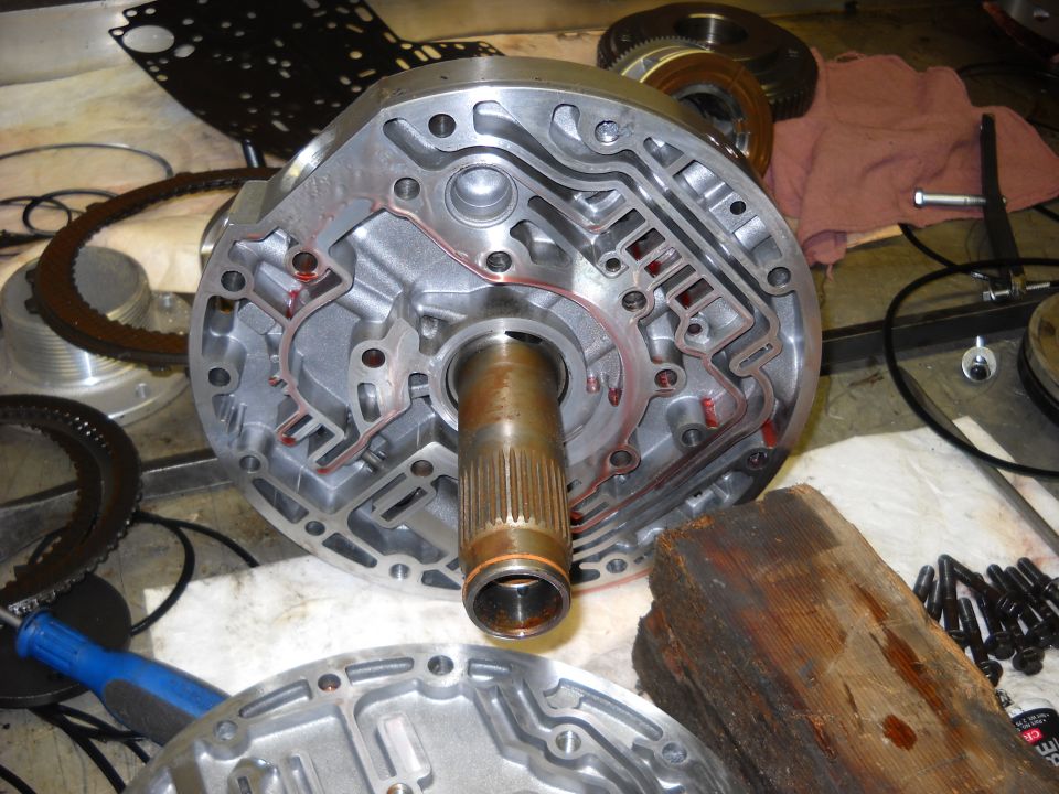 Disassembled transmission pump with internal channels visible
