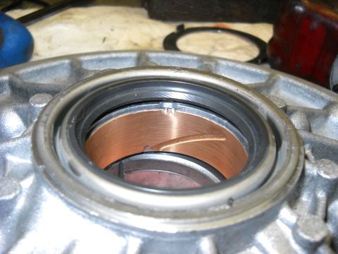 1993 Ford C-150 (Centurion Conversions) - Transmission part with a copper seal and metal housing visible.