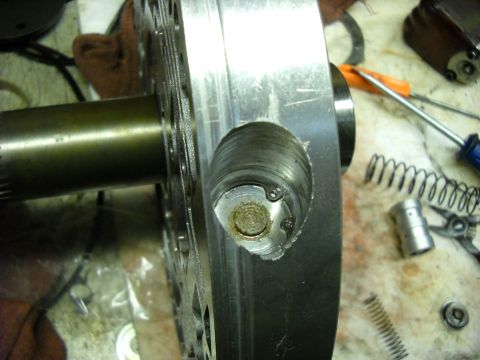 1993 Ford C-150 (Centurion Conversions) - Transmission pump part during an E4OD rebuild, showing internal components and repair tools.