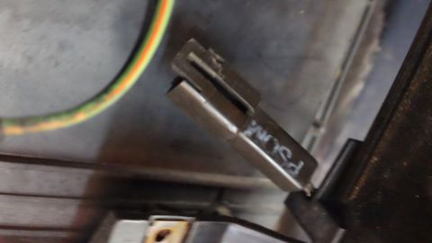 1994 Ford Bronco - A close-up view of an electrical connector with visible text and partially legible text.