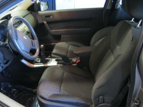 1976 Ford Ranchero - The interior of a car is shown, focusing on the driver's side and passenger seats.