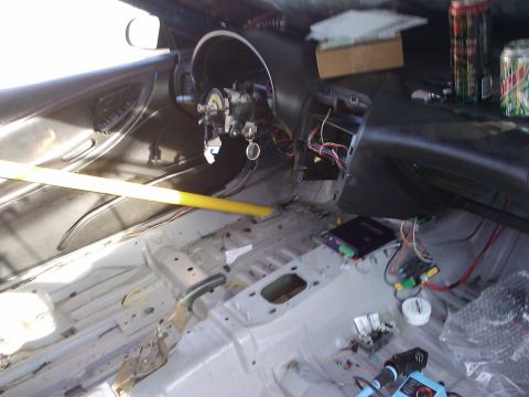 1995 Ford Probe - The interior of a 1995 Ford Probe shows extensive modifications and wiring work in-progress work.