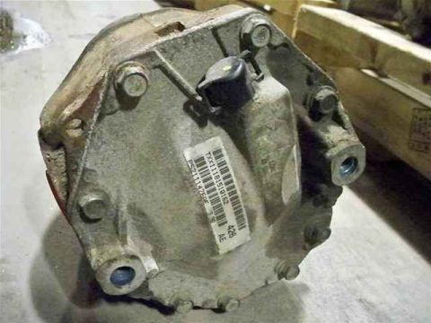 2010 Dodge Challenger - This is a close-up view of a differential housing, likely a replacement part, with a visible barcode sticker.