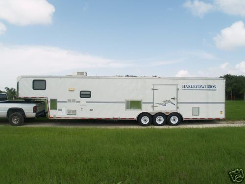 White Harley-Davidson enclosed triple-axle car hauler trailer