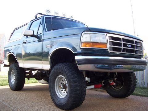 1992 Ford Bronco - This modified 1992 Ford Bronco features large off-road tires and auxiliary lighting on the roof.
