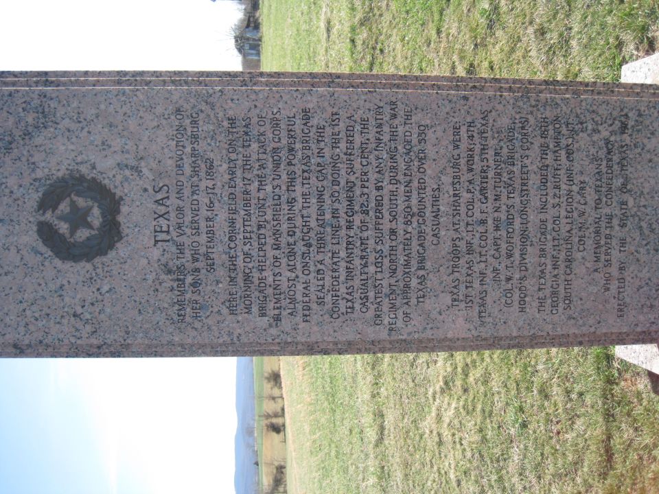 Engraved Texas Confederate memorial monument photographed in a field