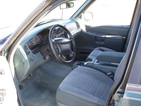 1997 Ford Explorer - Interior view of a 1997 Ford Explorer, highlighting the dashboard and seating.
