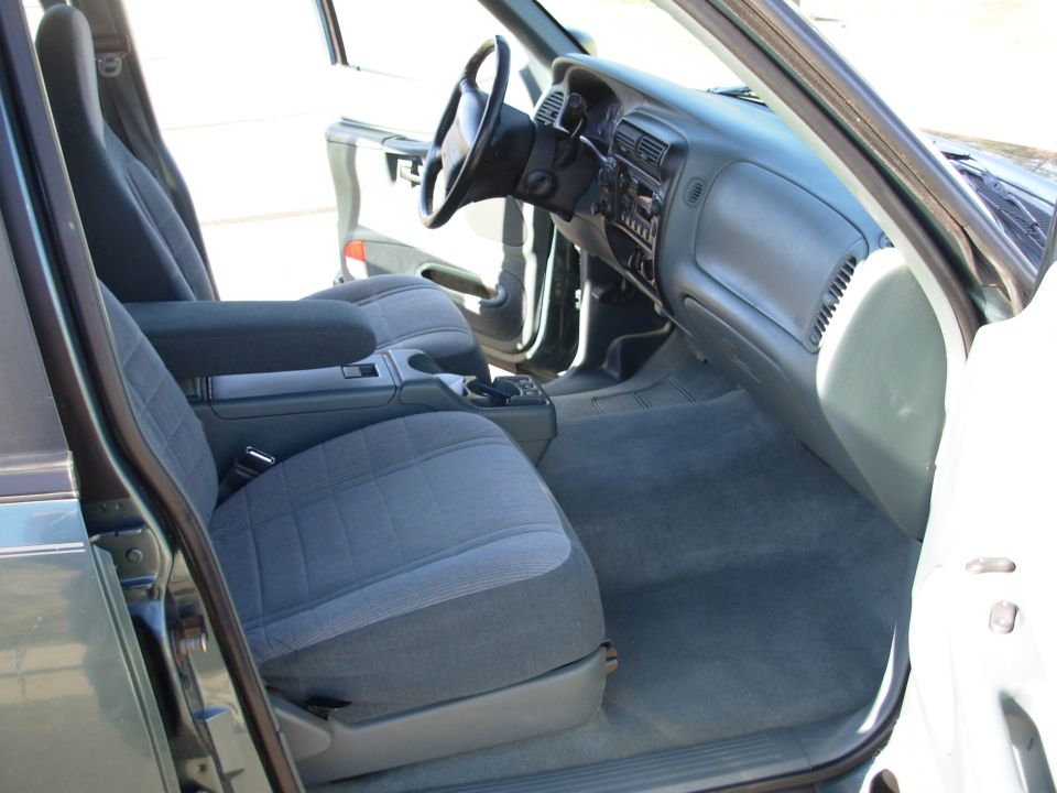 Front seats, dashboard, and center console of a car
