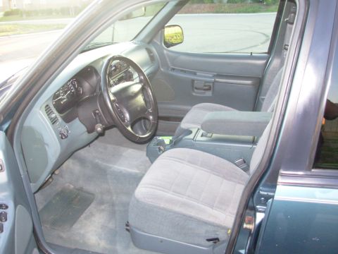 1997 Ford Explorer - Interior view of a 1997 Ford Explorer, highlighting the dashboard and seating.