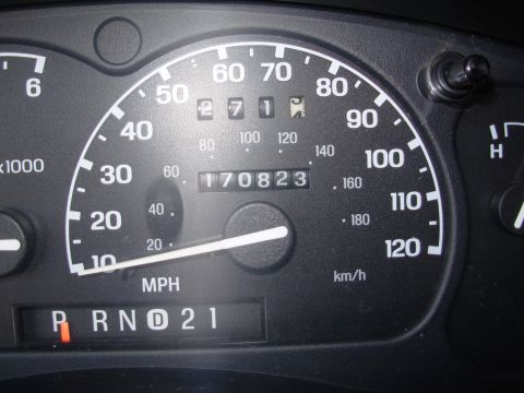 1997 Ford Explorer - The odometer reads 170,823 miles on the vehicle's interior dashboard.