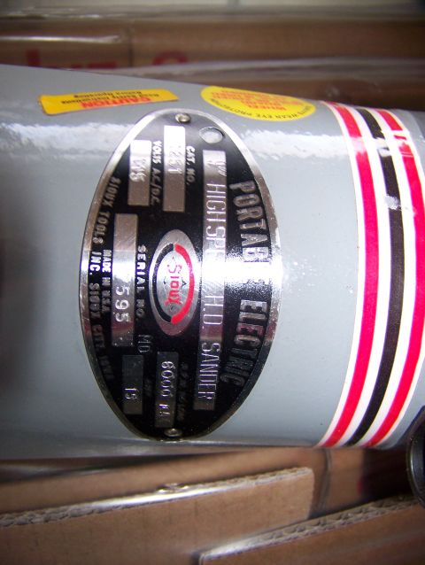 1992 Jeep YJ - Nameplate details for a Sioux Tools portable electric sander are visible.