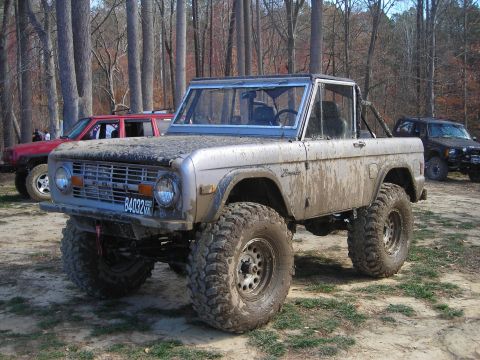 1995 Ford Bronco - This classic Ford Bronco is covered in mud after an off-road adventure.