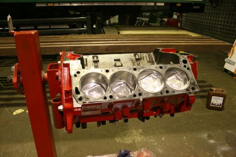 1973 Ford Ranchero - Engine block on a stand, likely undergoing rebuild or inspection. The registry claims it's a 1973 Ford Ranchero engine.