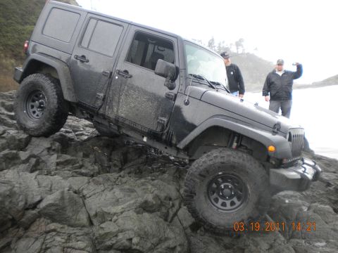 2005 Jeep Wrangler - Jeep Wrangler navigating a rocky coastal area.