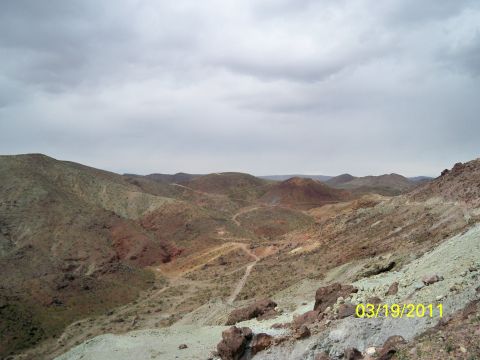 1992 Jeep Wrangler - A vast desert landscape unfolds with rolling hills and a visible dirt track, dated 03/19/2011.