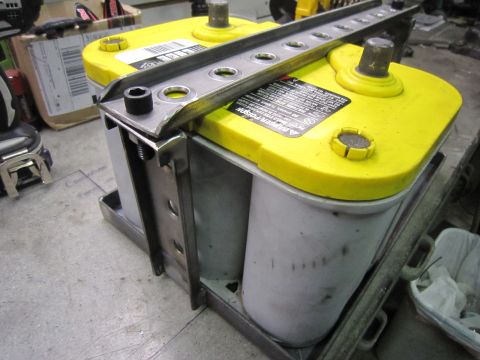 2008 Jeep Wrangler - A yellow top car battery is mounted in a custom metal bracket.
