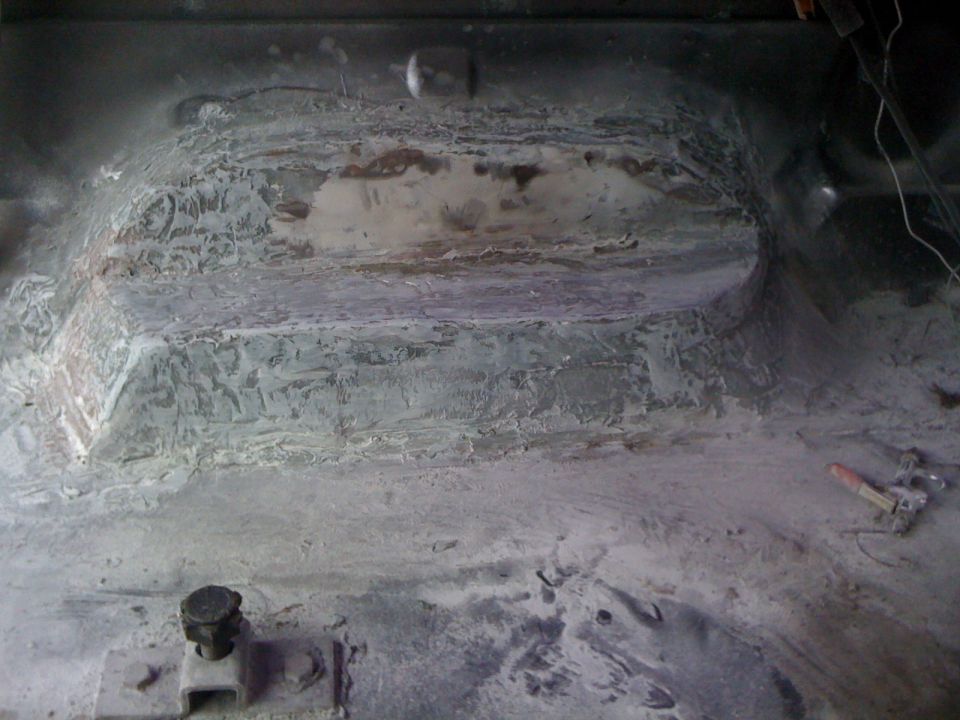 Interior floor pan with body filler and repair work
