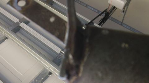 1994 Ford Bronco - A close-up view of a vehicle part, the Supermotors logo at the bottom right corner.
