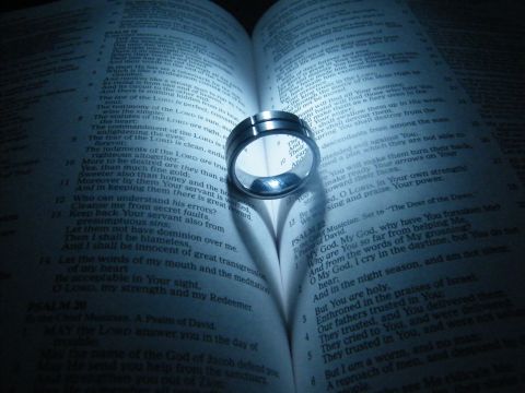 1982 Ford Bronco - A ring creates a heart-shaped shadow on the pages of an open bible.
