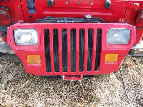 1992 Jeep YJ - Front grille and headlight assembly from a 1992 Jeep YJ.