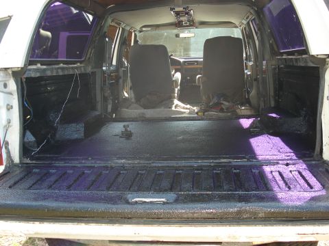 1992 Ford C-350 (Centurion Conversions) - The interior of a 1992 Ford C-350 (Centurion Conversions) shows the cargo area after seat removal.