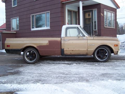 1969 Chevrolet C/K Pickup - This 1969 Chevrolet C/K Pickup shows signs of rust and has had some body panels replaced or repainted.