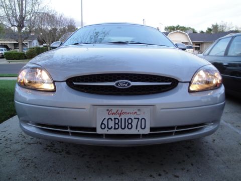 2003 Ford Taurus - The front grille and headlight design confirm this is a 2003 Ford Taurus.