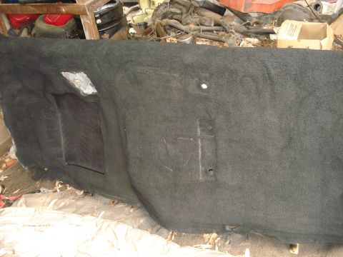 1992 Ford C-350 (Centurion Conversions) - Interior panel with cutouts, possibly for wheel well or other access.