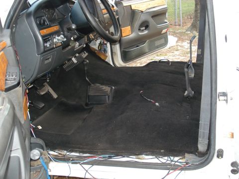 1992 Ford C-350 (Centurion Conversions) - Installing new black carpet in the interior of a 1992 Ford C-350 (Centurion Conversions).