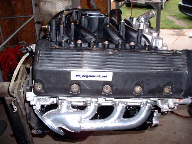 "New" engine with shorty headers.
