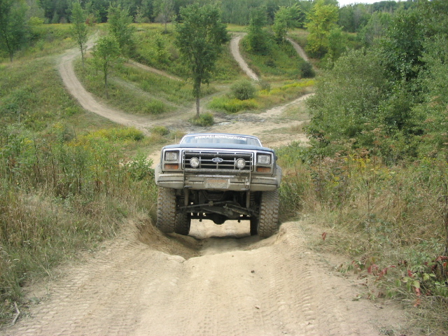 Ford F-Series truck going off-road on a dirt track