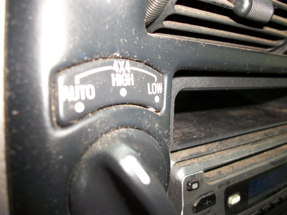 Interior 4x4 controls with AUTO, 4X4 HIGH, and LOW settings