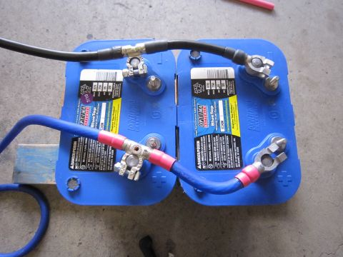 2008 Jeep Wrangler - Two Optima BlueTop batteries are wired together with red and black terminal connectors.