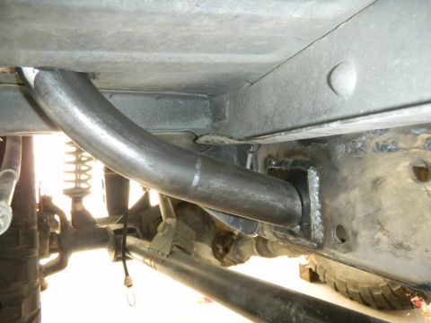 1997 Ford Ranger - Close-up view of custom roll cage tubing installation on a vehicle's frame.
