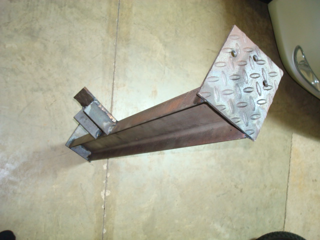 Custom metal bracket with diamond plate surface