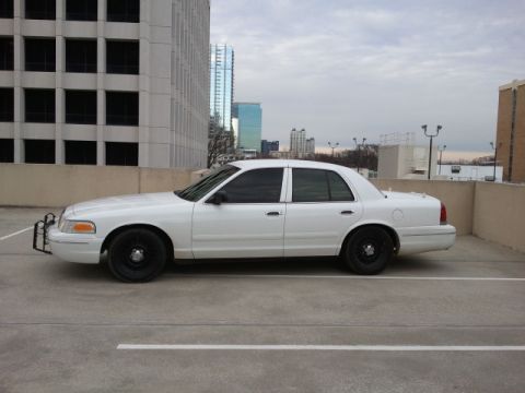1998 Ford Crown Victoria - This sedan has a push bar on the front, suggesting it might be a former police vehicle.