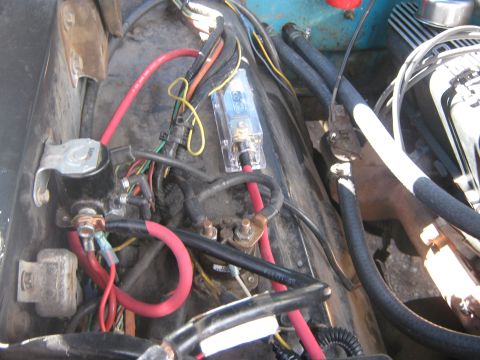 1972 Ford F-250 - Vehicle electrical system components including wiring, a fuse, and battery terminals are visible.