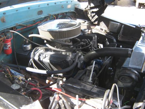 1972 Ford F-250 - The engine bay of a classic truck, showing the V8 engine and various components.