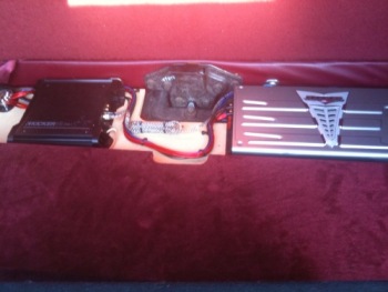 1995 Ford Bronco - Three car audio amplifiers are installed in the interior of a vehicle.