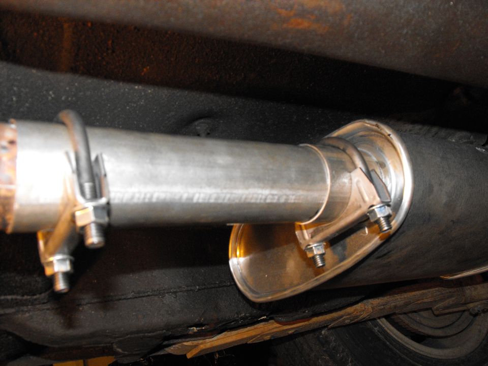 Pappy blew up the 78' Cordoba muffler (2 1/4) so I put in a 2 1/4 Hush Thrush forcing me to lengthen the pipe with the ID to OD extension pipe. Easy as pie.