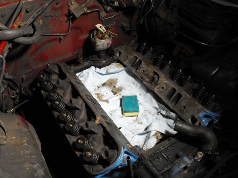 1982 Chrysler New Yorker - Gakets on and torqued to 95 ft/lb spec. The higher compression 302 swirl heads are on ! Bring on the mileage increase !