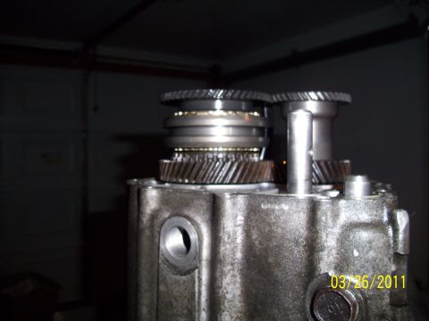 1995 Ford Probe - Close-up of gears and a metal housing, dated March 26, 2011.