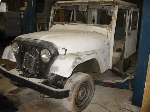 1974 Jeep CJ5 - WINDOW FRAME AND UPPER RAIN GUTTER HAD A TON OF CAULK INBEDDED ( THIS IS WHAT CAUSED THE RUST )